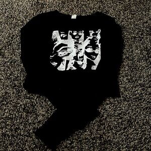 This is a long sleeved graphic tee from SHEIN
